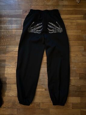 Black Sweatpants with Rhinestone Skeleton Hand Design